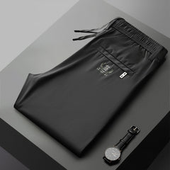 🔥👖【40-115 kg】 Nowa kolekcja na lato 2026: męskie spodnie z elastycznego jedwabiu, spodnie codzienne o prostym kroju z kieszeniami i elastycznym paskiem